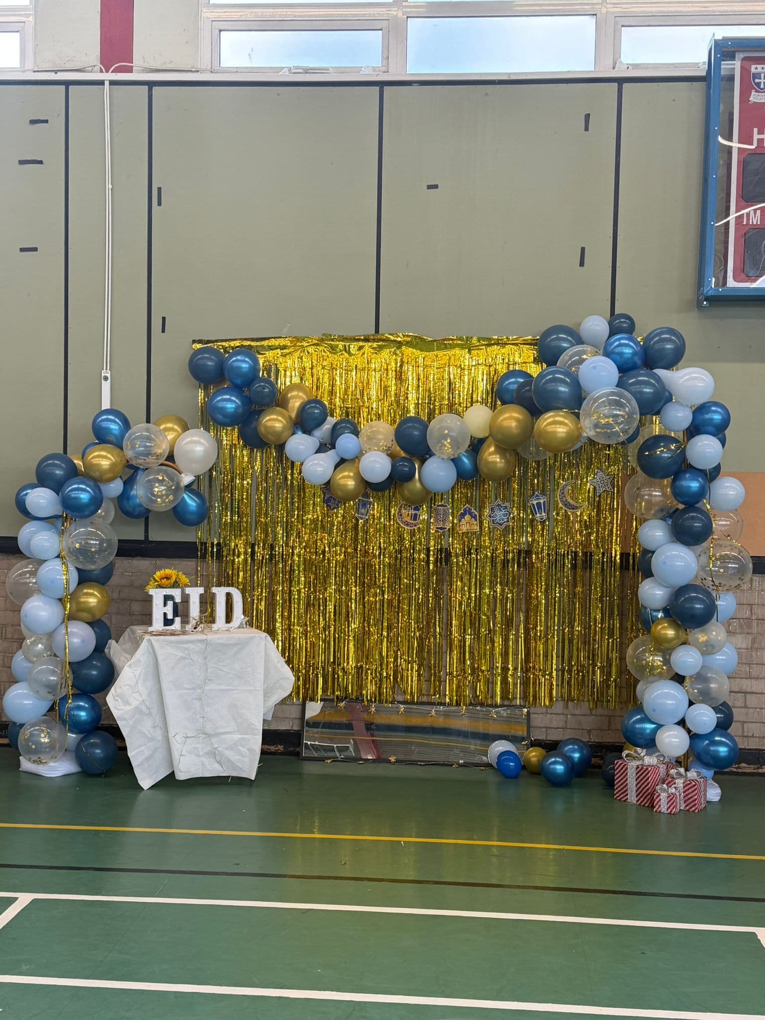 Eid decorations and balloon arch in the school hall